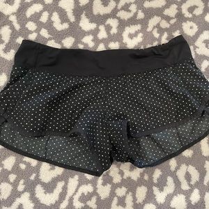 Like new woman’s black with polka dot lululemon speed up shorts size 10